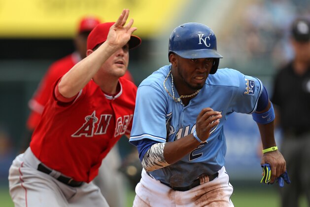 KANSAS CITY, MO - JUNE 29:  Cory Rasmus #46 of the Los Angeles Angels of Anaheim chases down Alcides Escobar #2 of the Kansas City Royals during a run down in the fifth inning at Kauffman Stadium on June 29, 2014 in Kansas City, Missouri. (Photo by Ed Zurga/Getty Images)