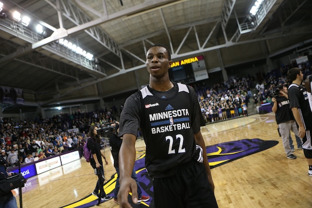 MANKATO, MN - SEPTEMBER 29:  Andrew Wiggins #22 of the Minnesota Timberwolves waives to fans at 2014 Training Camp opening event Dunks after Dark starting at midnight on September 29, 2014 at the Bresnan Arena Taylor Center on the campus of Minnesota State University, Mankato in Mankato, Minnesota.  NOTE TO USER: User expressly acknowledges and agrees that, by downloading and or using this Photograph, user is consenting to the terms and conditions of the Getty Images License Agreement. Mandatory Copyright Notice: Copyright 2014 NBAE (Photo by David Sherman/NBAE via Getty Images)