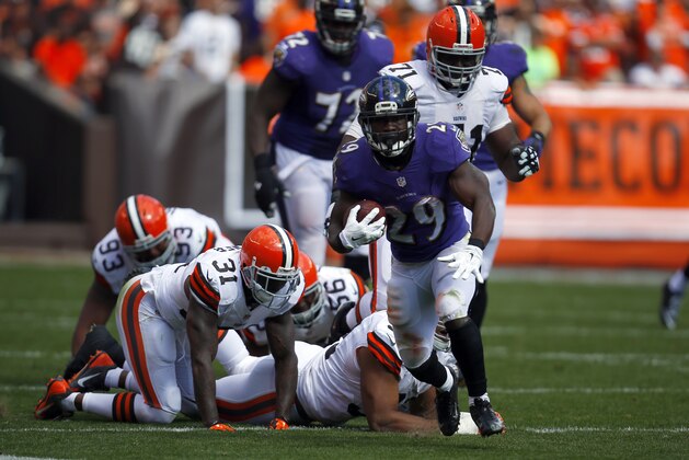 Baltimore Ravens running back Justin Forsett (29) runs the ball against the Cleveland Browns during an NFL game at the FirstEnergy Stadium in Cleveland on Sunday, Sept. 21, 2014. (Jeff Haynes/AP Images for Panini)