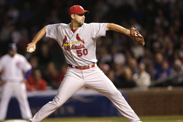St. Louis Cardinals starting pitcher Adam Wainwright delivers during the first inning of a baseball game against the Chicago Cubs Monday, Sept. 22, 2014, in Chicago. (AP Photo/Charles Rex Arbogast)