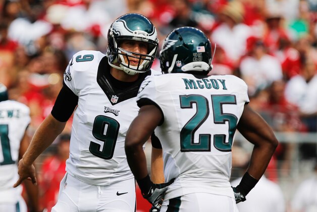Sep 28, 2014; Santa Clara, CA, USA; Philadelphia Eagles quarterback Nick Foles (9) with running back LeSean McCoy (25) before a play against the San Francisco 49ers during the second quarter at Levi's Stadium. Mandatory Credit: Kelley L Cox-USA TODAY Sports