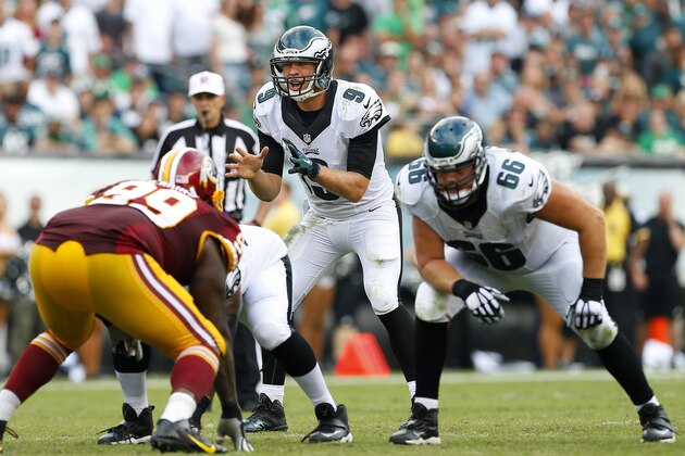 PHILADELPHIA, PA - SEPTEMBER 21:  Nick Foles #9 of the Philadelphia Eagles waits for the snap as Andrew Gardner #66 gets set to protect him against the Washington Redskins in the first half of the game at Lincoln Financial Field on September 21, 2014 in Philadelphia, Pennsylvania.  (Photo by Rich Schultz/Getty Images)