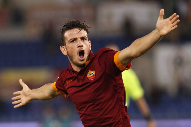 Roma’s Alessandro Florenzi celebrates after scoring during a Serie A soccer match between Roma and Hellas Verona, at Rome's Olympic stadium, Saturday, Sept. 27, 2014. (AP Photo/Riccardo De Luca)