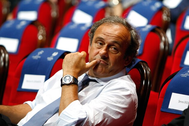 UEFA President Michel Platini, attends the soccer Europa League draw ceremony  at the Grimaldi Forum in Monaco, Friday, Aug. 29, 2014. (AP Photo/Claude Paris)
