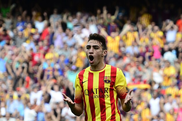 FC Barcelona's Munir El Haddadi Mohamed gestures during a Spanish La Liga soccer match against Athletic Bilbao at the Camp Nou stadium in Barcelona, Spain, Saturday, Sept. 13, 2014. (AP Photo/Manu Fernandez)