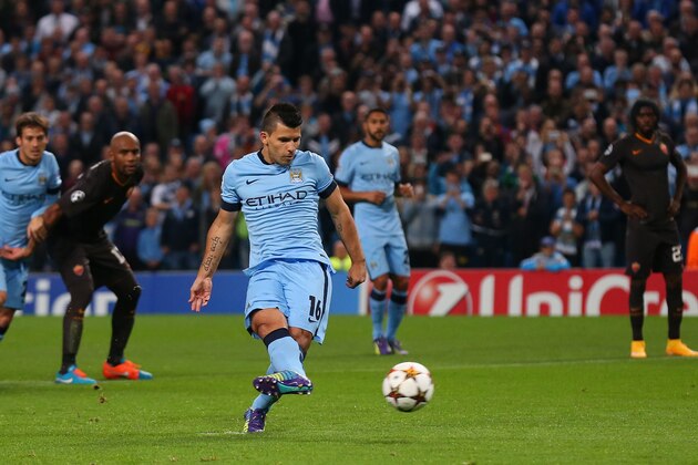 MANCHESTER, ENGLAND - SEPTEMBER 30:  Sergio Aguero of Manchester City scores the opening goal from a penalty kick during the UEFA Champions League Group E match between Manchester City FC and AS Roma  on September 30, 2014 in Manchester, United Kingdom.  (Photo by Alex Livesey/Getty Images)