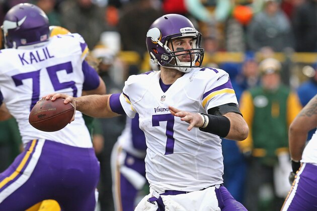 GREEN BAY, WI - NOVEMBER 24: Christian Ponder #7 of the Minnesota Vikings passes against the Green Bay Packers at Lambeau Field on November 24, 2013 in Green Bay, Wisconsin. The Vikings and the Packers tied 26-26 after overtime. (Photo by Jonathan Daniel/Getty Images)