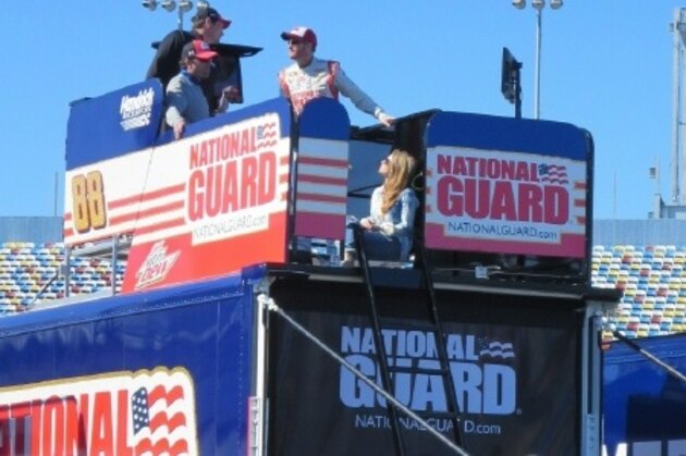 Dale Earnhardt Jr. and crew discuss qualifying earlier this year at Daytona International Speedway.
