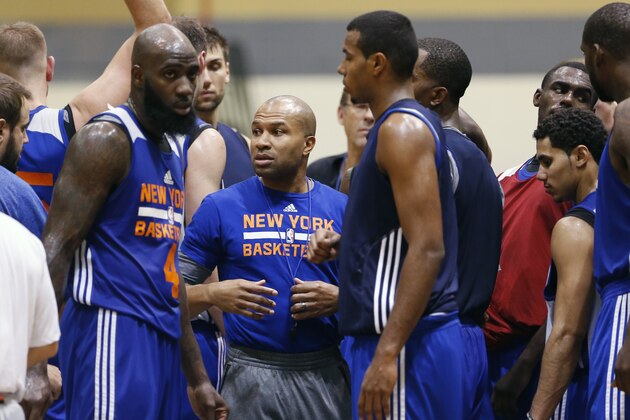 New York Knicks basketball  coach Derek Fisher talks to players during practice at the team's NBA training camp at the U.S. Military Academy on Tuesday, Sept. 30, 2014, in West Point, N.Y. (AP Photo/Mike Groll)