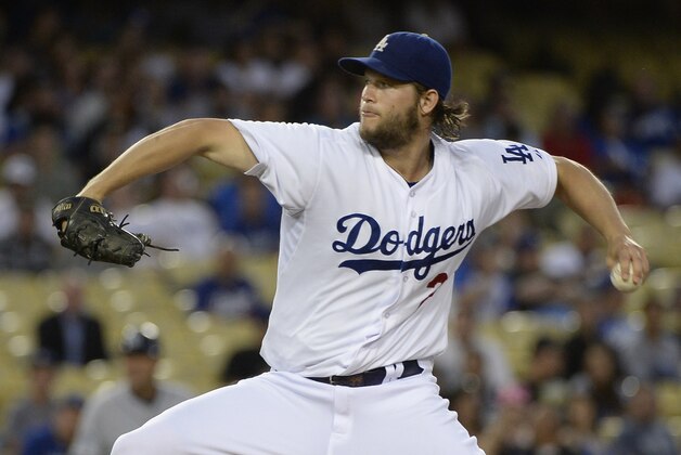 Sep 8, 2014; Los Angeles, CA, USA; Los Angeles Dodgers starting pitcher Clayton Kershaw throws a pitch against the San Diego Padres during the game at Dodger Stadium. Mandatory Credit: Richard Mackson-USA TODAY Sports