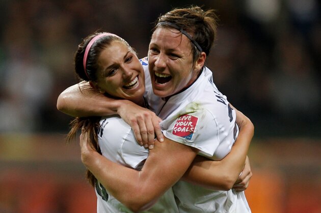 FRANKFURT AM MAIN, GERMANY - JULY 17:  Alex Morgan (L) of USA celebrates scoring the first goal with Abby Wambach (R) during the FIFA Women's World Cup Final match between Japan and USA at the FIFA World Cup stadium Frankfurt on July 17, 2011 in Frankfurt am Main, Germany.  (Photo by Friedemann Vogel/Getty Images)