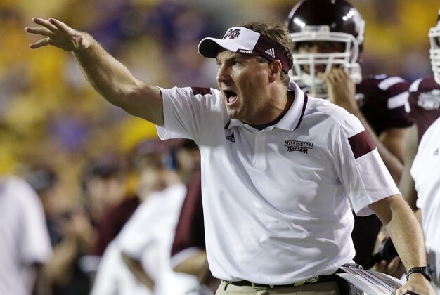 Mississippi State head coach Dan Mullen calls out from the sideline in the second half of an NCAA college football game in Baton Rouge, La., Saturday, Sept. 20, 2014. Mississippi State won 34-29. (AP Photo/Gerald Herbert)