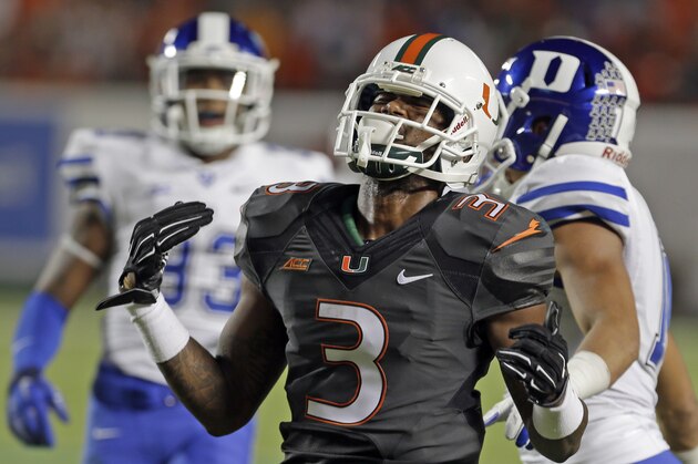 Miami wide receiver Stacy Coley (3) reacts after dropping a pass against Duke in the first  half of an NCAA college football game in Miami Gardens, Fla., Saturday, Sept. 27, 2014. (AP Photo/Alan Diaz)