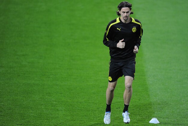 MADRID, SPAIN - NOVEMBER 05: Neven Subotic of Borussia Dortmund exercises during a training session at Estadio Santiago Bernabeu on November 5, 2012 in Madrid, Spain. Borussia play Real Madrid in the UEFA Champions League Group D match on November 6, 2012 in Madrid, Spain.  (Photo by Denis Doyle/Getty Images)