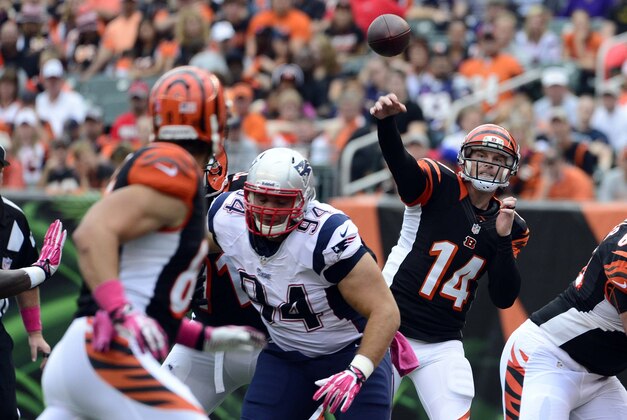 Oct 6, 2013; Cincinnati, OH, USA; Cincinnati Bengals quarterback Andy Dalton (14) throws a pass to tight end Tyler Eifert (85) in the second half of the game against the New England Patriots at Paul Brown Stadium. The Bengals won 13-6.  Mandatory Credit: Marc Lebryk-USA TODAY Sports