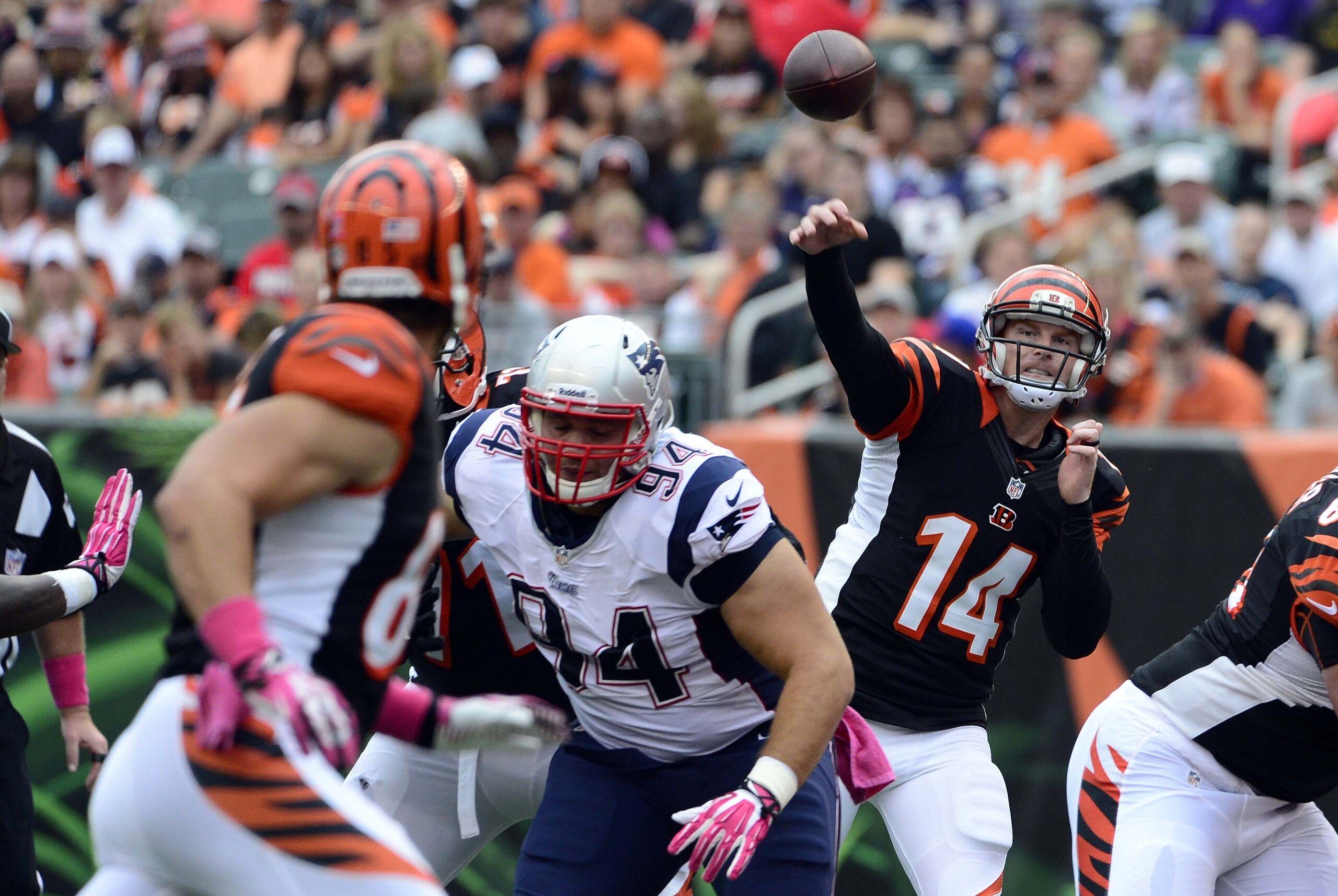 Oct 6, 2013; Cincinnati, OH, USA; Cincinnati Bengals quarterback Andy Dalton (14) throws a pass to tight end Tyler Eifert (85) in the second half of the game against the New England Patriots at Paul Brown Stadium. The Bengals won 13-6.  Mandatory Credit: Marc Lebryk-USA TODAY Sports