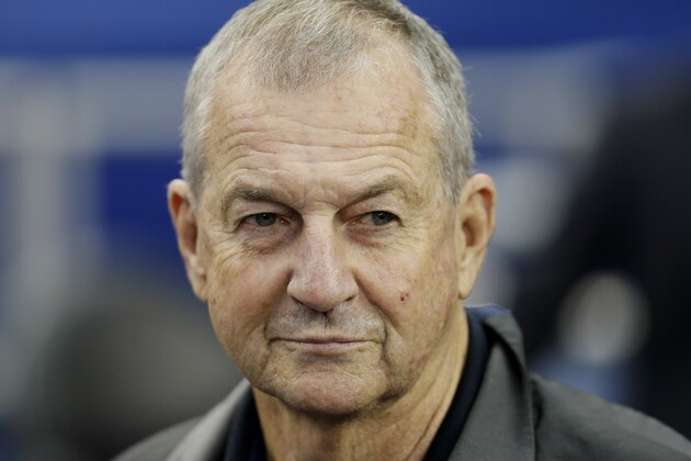 Former Connecticut head coach Jim Calhoun watches the team during practice for their NCAA Final Four tournament college basketball semifinal game Friday, April 4, 2014, in Dallas. Connecticut plays Florida on Saturday, April 5, 2014. (AP Photo/Charlie Neibergall)