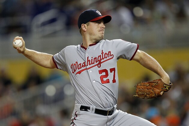MIAMI, FL - SEPTEMBER 20: Jordan Zimmerman #27 of the Washington Nationals delivers a pitch  against the Miami Marlins in the first inning at Marlins Park on September 20, 2014 in Miami, Florida. (Photo by Eliot J. Schechter/Getty Images)