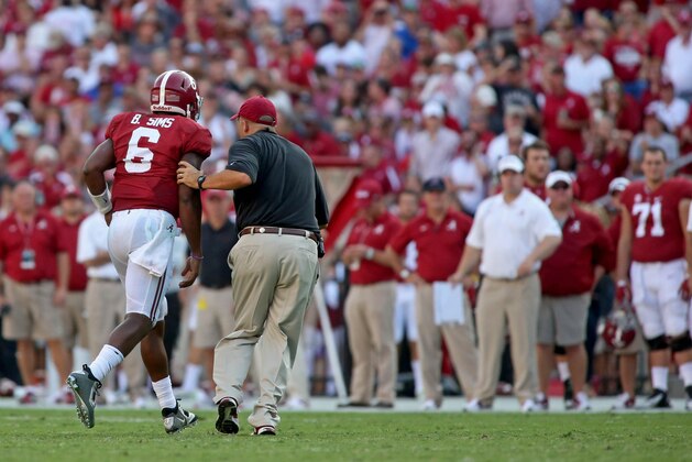 Sep 20, 2014; Tuscaloosa, AL, USA; Alabama Crimson Tide quarterback Blake Sims (6) leaves the field after an injury in the third quarter of their game against the Florida Gators at Bryant-Denny Stadium. Alabama won 42-21. Mandatory Credit: Jason Getz-USA TODAY Sports