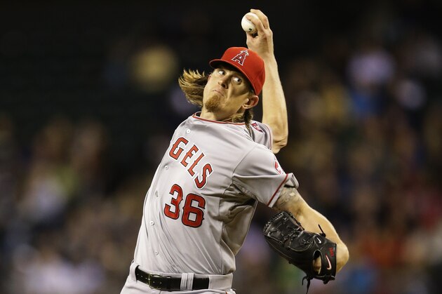 Los Angeles Angels starting pitcher Jered Weaver throws against the Seattle Mariners in a baseball game, Friday, Sept. 26, 2014, in Seattle. (AP Photo/Ted S. Warren)