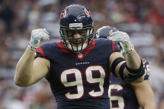 Houston Texans defensive end J.J. Watt (99) tries to fire up the crowd during the fourth quarter of an NFL football game, Sunday, Sept. 28, 2014, in Houston. (AP Photo/David J. Phillip)