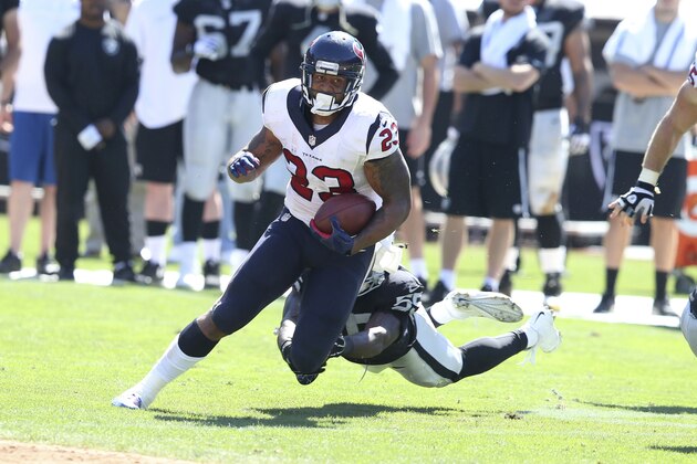 Houston Texans RB #23 Arian Foster in action in the second quarter in a game against the Oakland Raiders at the O.co Coliseum at an NFL game in Oakland, Calif. on Sunday Sept. 14, 2014. (AP Photo/David Seelig)