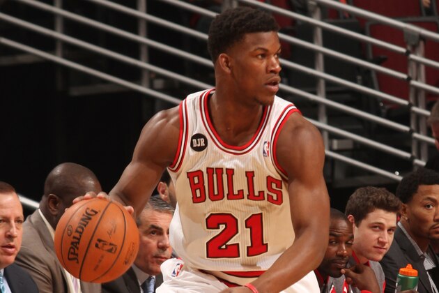 CHICAGO, IL - APRIL 11: Jimmy Butler #21 of the Chicago Bulls handles the ball against the Detroit Pistons on April 11, 2014 at the United Center in Chicago, Illinois. NOTE TO USER: User expressly acknowledges and agrees that, by downloading and or using this Photograph, user is consenting to the terms and conditions of the Getty Images License Agreement. Mandatory Copyright Notice: Copyright 2014 NBAE (Photo by Ray Amati/NBAE via Getty Images)