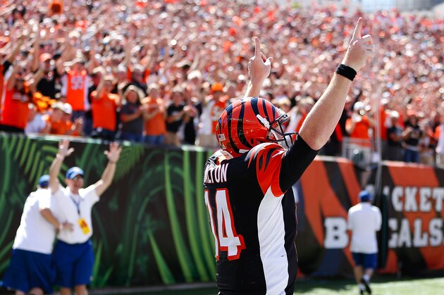 CINCINNATI, OH - SEPTEMBER 21:  Andy Dalton #14 of the Cincinnati Bengals celebrates after scoring a touchdown during the first quarter against the Tennessee Titans at Paul Brown Stadium on September 21, 2014 in Cincinnati, Ohio. (Photo by Joe Robbins/Getty Images)