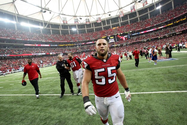Sep 7, 2014; Atlanta, GA, USA; Atlanta Falcons outside linebacker Paul Worrilow (55) walks off of the field after their win over the New Orleans Saints at the Georgia Dome. The Falcons won 37-34 in overtime. Mandatory Credit: Jason Getz-USA TODAY Sports
