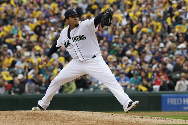 Seattle Mariners starting pitcher Felix Hernandez throws against the Los Angeles Angels during a baseball game, Sunday, Sept. 28, 2014, in Seattle. (AP Photo/Ted S. Warren)