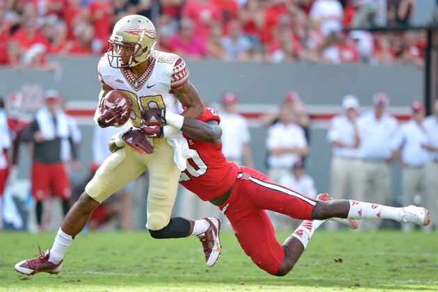 RALEIGH, NC - SEPTEMBER 27:  Rashad Greene #80 of the Florida State Seminoles makes a catch against the North Carolina State Wolfpack during their game at Carter-Finley Stadium on September 27, 2014 in Raleigh, North Carolina.  (Photo by Grant Halverson/Getty Images)