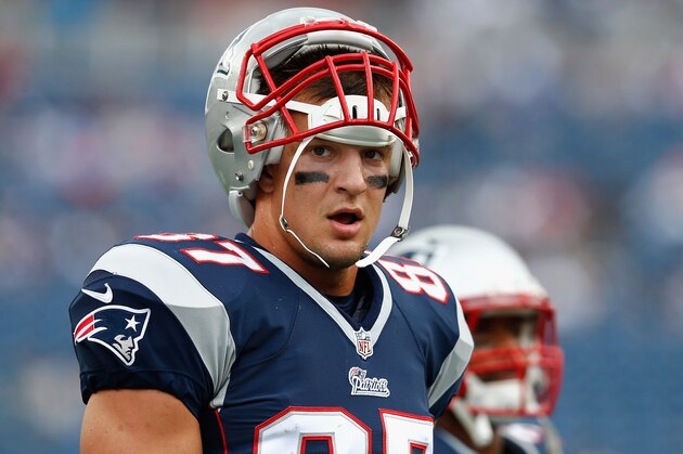 FOXBORO, MA - SEPTEMBER 21: Rob Gronkowski #87 of the New England Patriots warms up during pre-game before playing the Oakland Raiders at Gillette Stadium on September 21, 2014 in Foxboro, Massachusetts.  (Photo by Jim Rogash/Getty Images)
