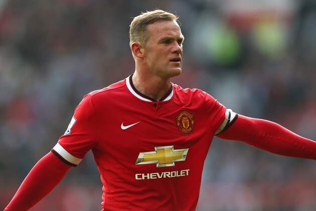 MANCHESTER, ENGLAND - SEPTEMBER 14:  Wayne Rooney of Manchester United gestures during the Barclays Premier League match between Manchester United and Queens Park Rangers at Old Trafford on September 14, 2014 in Manchester, England.  (Photo by Alex Livesey/Getty Images)