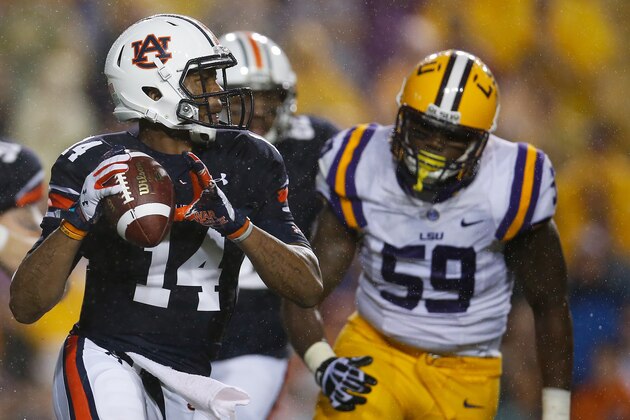 BATON ROUGE, LA - SEPTEMBER 21:  Nick Marshall #14 of the Auburn Tigers looks to throw a pass against the LSU Tigers at Tiger Stadium on September 21, 2013 in Baton Rouge, Louisiana.  (Photo by Chris Graythen/Getty Images)