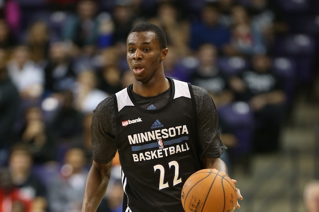 MANKATO, MN - SEPTEMBER 29:  Andrew Wiggins #22 of the Minnesota Timberwolves brings the ball up the court during a scrimmage at 2014 Training Camp opening event Dunks after Dark starting at midnight on September 29, 2014 at the Bresnan Arena Taylor Center on the campus of Minnesota State University, Mankato in Mankato, Minnesota.  NOTE TO USER: User expressly acknowledges and agrees that, by downloading and or using this Photograph, user is consenting to the terms and conditions of the Getty Images License Agreement. Mandatory Copyright Notice: Copyright 2014 NBAE (Photo by David Sherman/NBAE via Getty Images)
