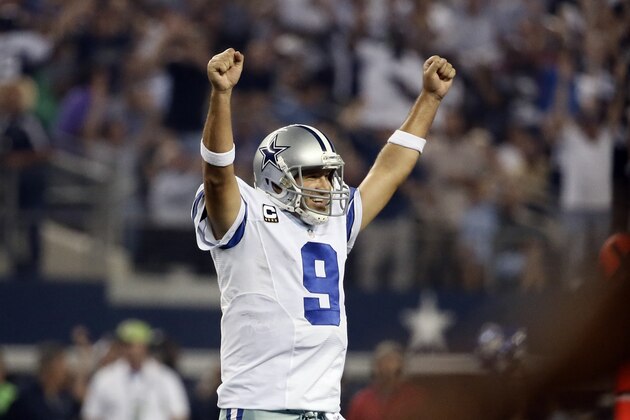 Dallas Cowboys' Tony Romo celebrates a touchdown runby DeMarco Murray during the second half of an NFL football game against the New Orleans Saints, Sunday, Sept. 28, 2014, in Arlington, Texas. (AP Photo/Brandon Wade)