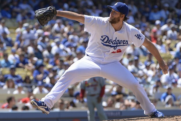 Jun 29, 2014; Los Angeles, CA, USA; Los Angeles Dodgers starting pitcher Clayton Kershaw (22) throws in the 5th inning against the St. Louis Cardinals at Dodger Stadium. Mandatory Credit: Robert Hanashiro-USA TODAY Sports