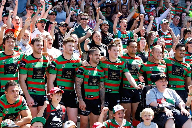 SYDNEY, AUSTRALIA - SEPTEMBER 29:  Souths players pose for a photo with fans during a South Sydney Rabbitohs NRL media session at Redfern Oval on September 29, 2014 in Sydney, Australia.  (Photo by Renee McKay/Getty Images)