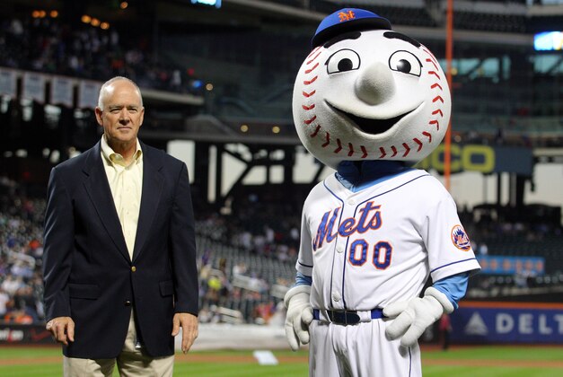 Sep 26, 2014; New York, NY, USA; New York Mets general manager Sandy Alderson on the field with mascot Mr. Met before a game against the Houston Astros at Citi Field. Mandatory Credit: Brad Penner-USA TODAY Sports
