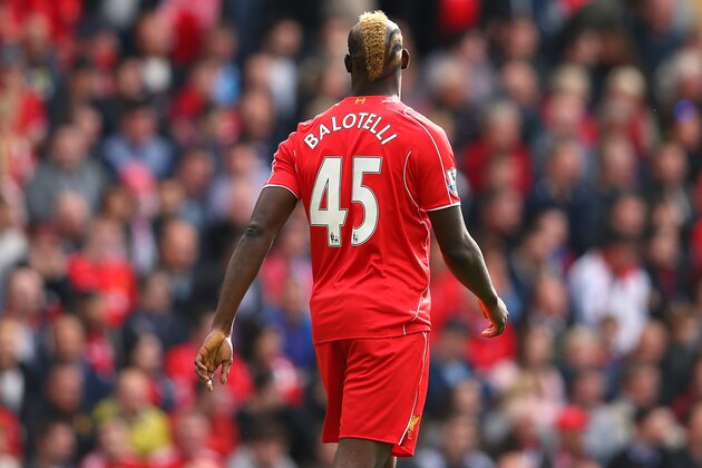 LIVERPOOL, ENGLAND - SEPTEMBER 27:  Mario Balotelli of Liverpool looks on during the Barclays Premier League match between Liverpool and Everton at Anfield on September 27, 2014 in Liverpool, England.  (Photo by Alex Livesey/Getty Images)
