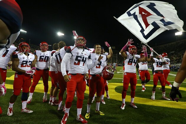 EUGENE, OR - OCTOBER 02:  The Arizona Wildcats celebrate their 31-24 victory over the Oregon Ducks at Autzen Stadium on October 2, 2014  in Eugene, Oregon.  (Photo by Jonathan Ferrey/Getty Images)