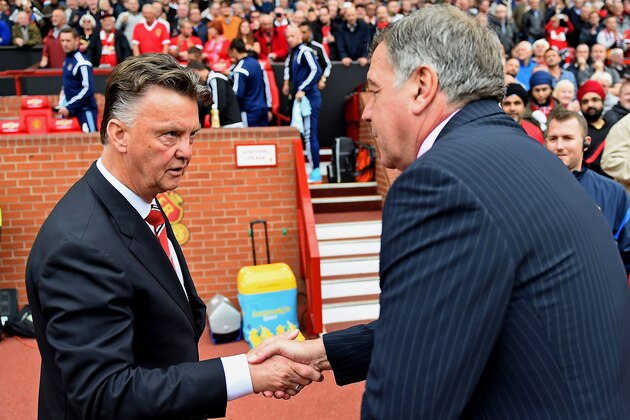MANCHESTER, ENGLAND - SEPTEMBER 27:  (L-R) Louis van Gaal the manager of Manchester United and Sam Allardyce the West Ham manager shake hands during the Barclays Premier League match between Manchester United and West Ham United at Old Trafford on September 27, 2014 in Manchester, England.  (Photo by Laurence Griffiths/Getty Images)