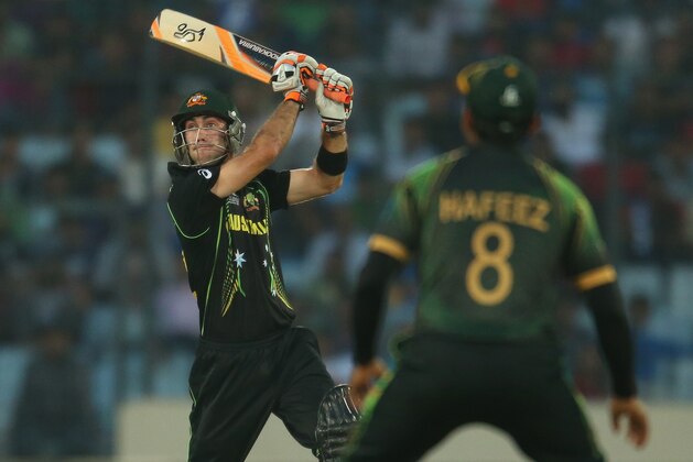 DHAKA, BANGLADESH - MARCH 23:  Glenn Maxwell of Australia hits a boundary during the ICC World Twenty20 Bangladesh 2014 match between Australia and Pakistan at Sher-e-Bangla Mirpur Stadium on March 23, 2014 in Dhaka, Bangladesh.  (Photo by Scott Barbour/Getty Images)