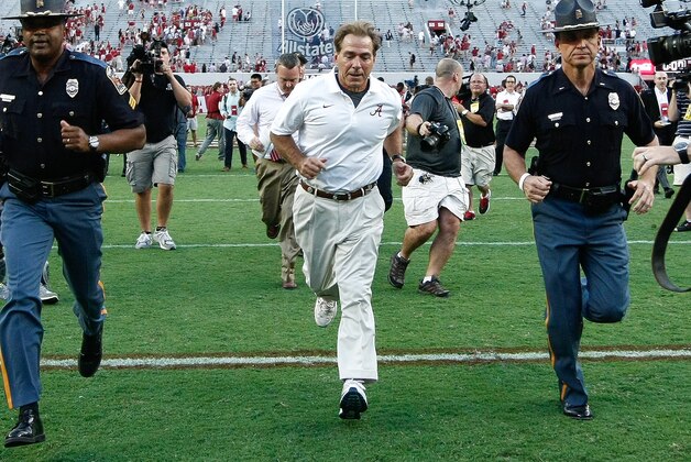 Sep 20, 2014; Tuscaloosa, AL, USA; Alabama Crimson Tide head coach Nick Saban leaves the field after his team defeated the Florida Gators 42-21 at Bryant-Denny Stadium. Mandatory Credit: Marvin Gentry-USA TODAY Sports