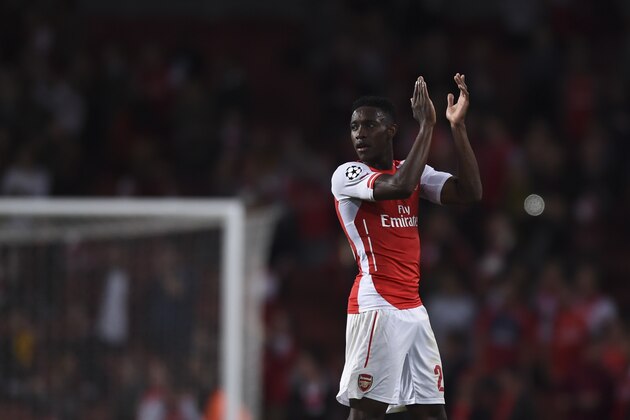 Arsenal's Danny Welbeck  claps his hands after the end of a Champions League Group D soccer match between Arsenal  and Galatasaray , at the Emirates Stadium in London, on Wednesday, Oct 1, 2014. Welbeck score a hat-trick and his team won 4-1.(AP Photo/ Tim Ireland)