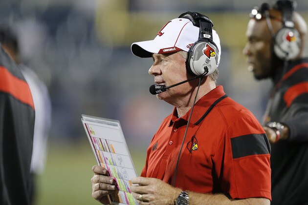 MIAMI, FL - SEPTEMBER 20: Head coach Bobby Petrino of the Louisville Cardinals looks on during fourth quarter action against the Florida International Panthers on September 20, 2014 at FIU Stadium in Miami, Florida. Louisville defeated FIU 34-3. (Photo by Joel Auerbach/Getty Images)