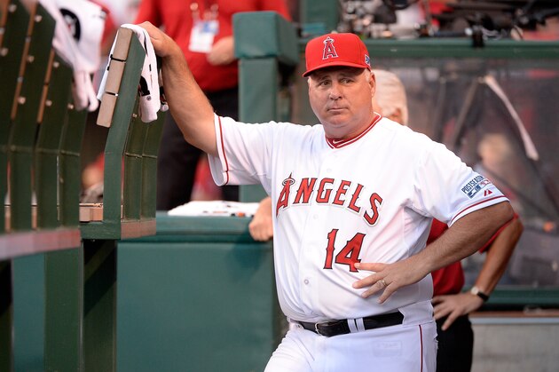 ANAHEIM, CA - OCTOBER 02: Mike Scioscia #14 of the Los Angeles Angels looks on during prior to Game One of the American League Division Series against the Kansas City Royals at Angel Stadium of Anaheim on October 2, 2014 in Anaheim, California. (Photo by Harry How/Getty Images) ANAHEIM, CA - OCTOBER 02: Mike Scioscia #14 of the Los Angeles Angels looks on during prior to Game One of the American League Division Series against the Kansas City Royals at Angel Stadium of Anaheim on October 2, 2014 in Anaheim, California. (Photo by Harry How/Getty Images)