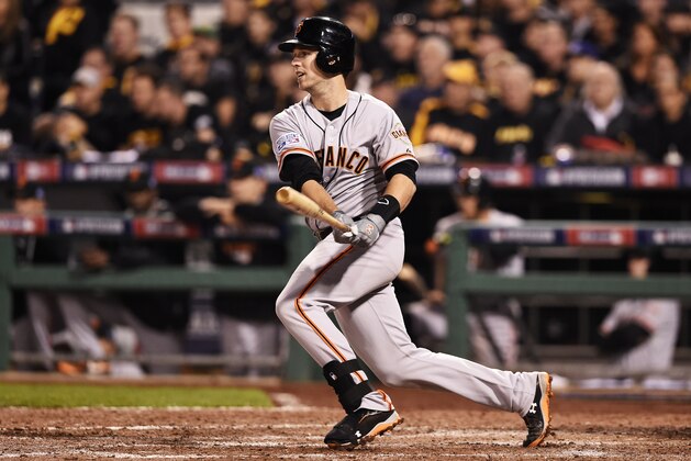 PITTSBURGH, PA - OCTOBER 01:  Buster Posey #28 of the San Francisco Giants singles in the seventh inning against the Pittsburgh Pirates during the National League Wild Card game at PNC Park on October 1, 2014 in Pittsburgh, Pennsylvania.  (Photo by Jason Miller/Getty Images)