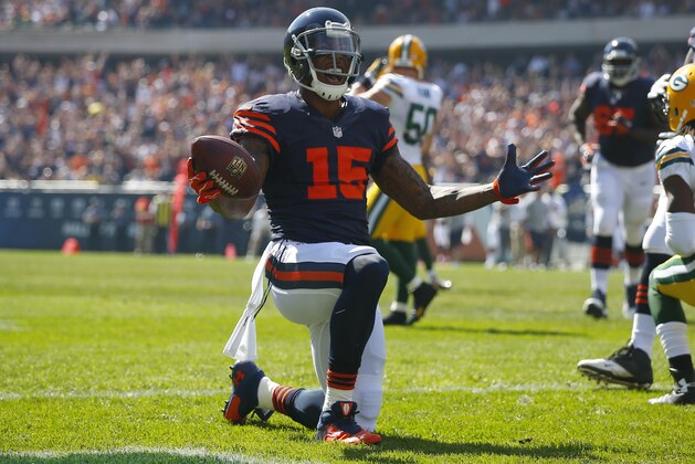 Chicago Bears wide receiver Brandon Marshall (15) celebrates after scoring a touchdown against the Green Bay Packers during an NFL game at Soldier Field in Chicago on Sunday, Sept. 28, 2014. (Jeff Haynes/AP Images for Panini)