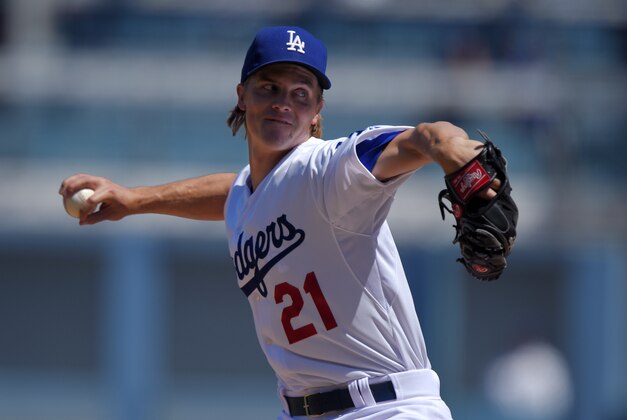 Los Angeles Dodgers starting pitcher Zack Greinke throws to the plate during the first inning of a baseball game against the Arizona Diamondbacks, Sunday, Sept. 7, 2014, in Los Angeles. (AP Photo/Mark J. Terrill)